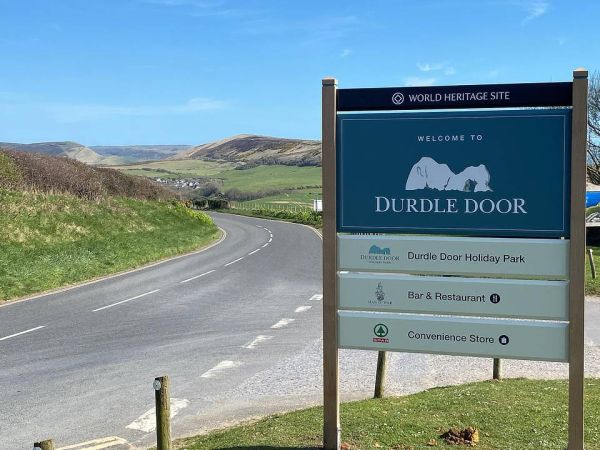 Durdle Door World Heritage Site welcome signage